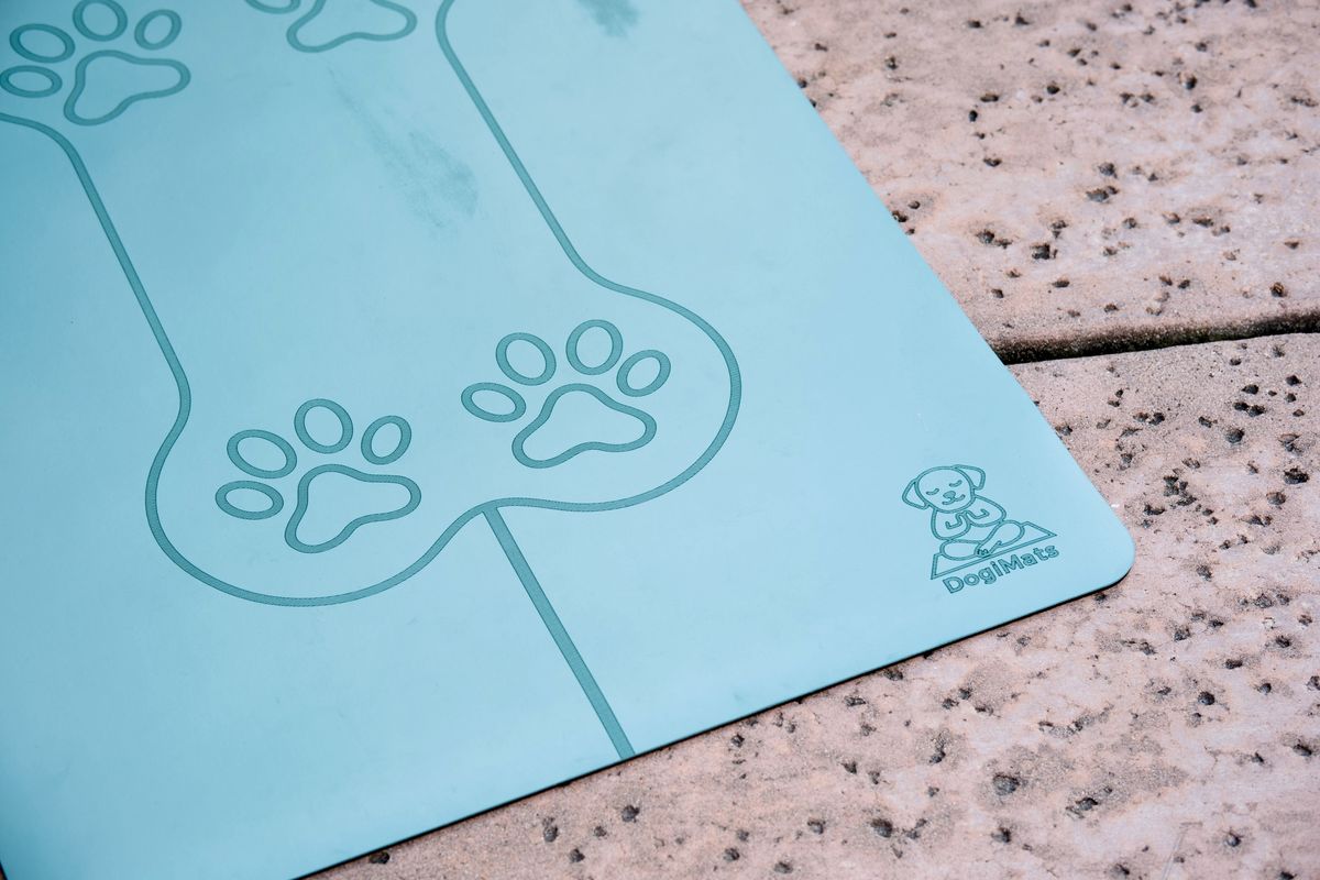Close-up of paw print engraving on a DogiMat